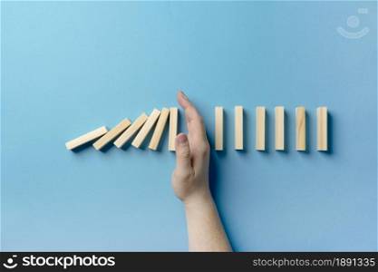 top view pause wooden blocks falling. Resolution and high quality beautiful photo. top view pause wooden blocks falling. High quality and resolution beautiful photo concept