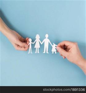 top view people holding hands cute paper family. Resolution and high quality beautiful photo. top view people holding hands cute paper family. High quality and resolution beautiful photo concept