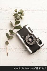 top view photo camera wooden table. Resolution and high quality beautiful photo. top view photo camera wooden table. High quality and resolution beautiful photo concept