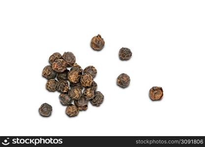 Top view pile of dried natural black pepper seeds on white background with clipping path.