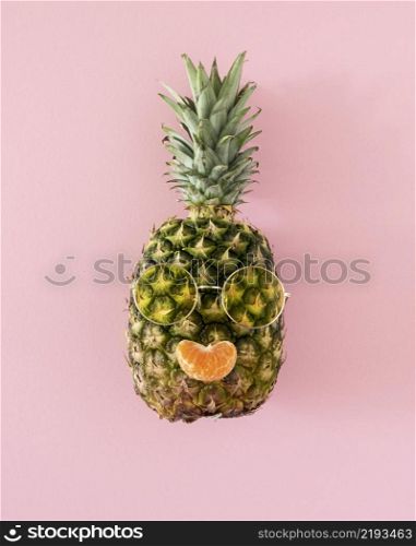 top view pineapple with sunglasses