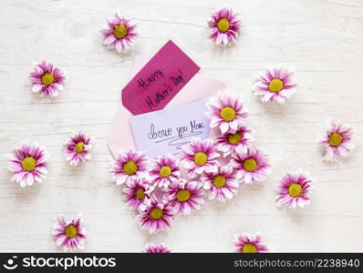 top view pink flowers wooden table