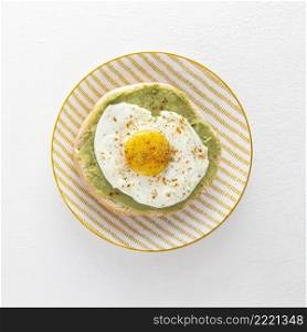 top view pita with avocado fried egg plate