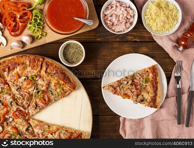 top view pizza with red pepper slice plate