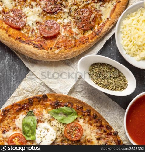 top view pizzas with peperoni tomatoes