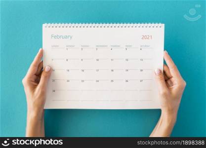 top view planner calendar hands. Resolution and high quality beautiful photo. top view planner calendar hands. High quality beautiful photo concept