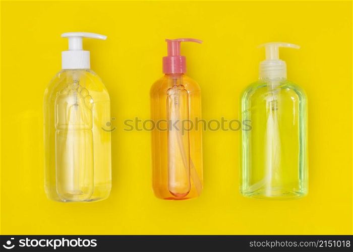 top view plastic bottles with hand sanitizer liquid soap