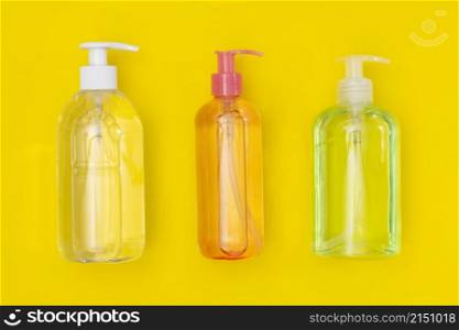 top view plastic bottles with hand sanitizer liquid soap