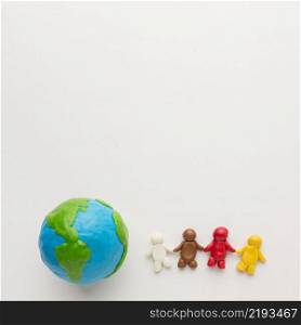 top view plasticine globe people with copy space