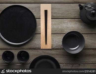 top view plate with chopsticks teapot