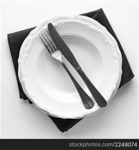 top view plates with cutlery napkin