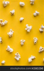 top view popcorn yellow background