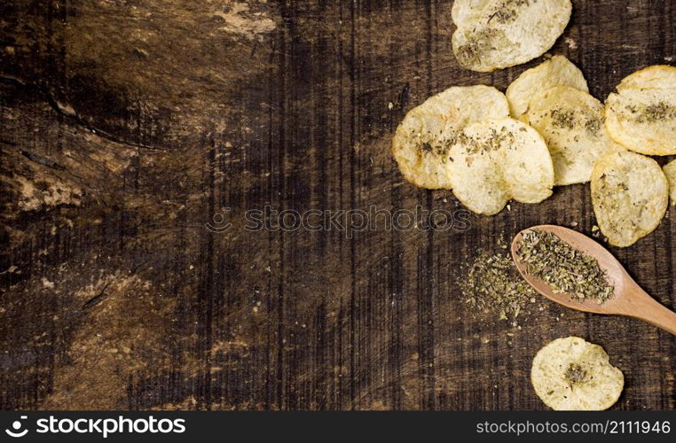 top view potato chips with copy space spices