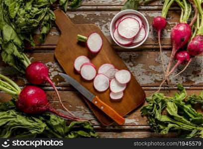 top view radishes with knife. High resolution photo. top view radishes with knife. High quality photo