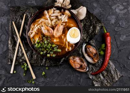 top view ramen dish with shrimps oysters