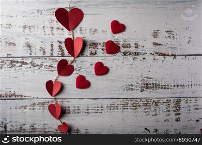 Top view Red heart in line on wood background