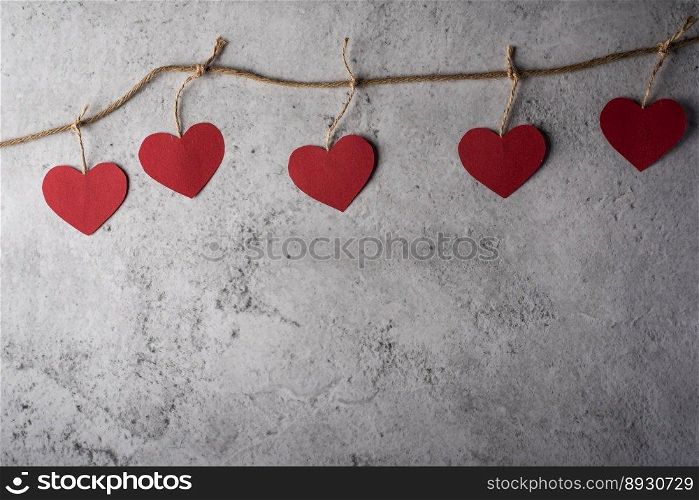 Top view Red heart on wall background