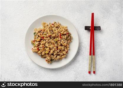 top view rice with vegetables plate chopsticks. Resolution and high quality beautiful photo. top view rice with vegetables plate chopsticks. High quality and resolution beautiful photo concept