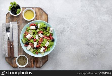 top view salad with feta cheese cutting board with copy space. Resolution and high quality beautiful photo. top view salad with feta cheese cutting board with copy space. High quality and resolution beautiful photo concept