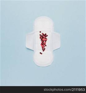 top view sanitary towel with red sequins