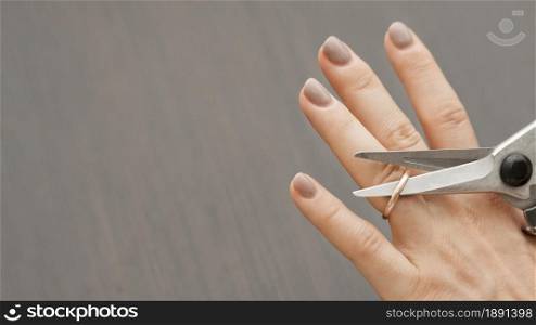 top view scissors cutting wedding ring. Resolution and high quality beautiful photo. top view scissors cutting wedding ring. High quality and resolution beautiful photo concept