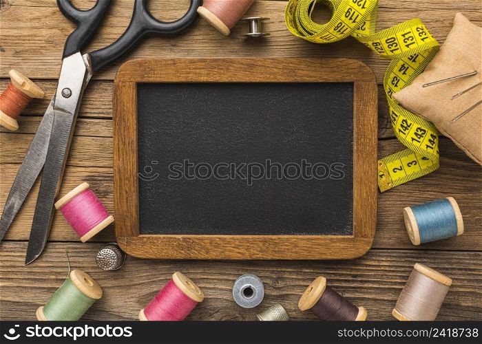 top view scissors with measuring tape chalkboard