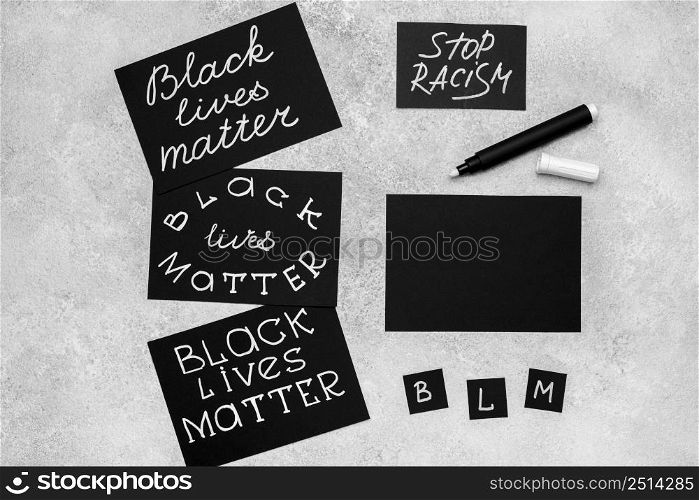 top view selection cards with black lives matter pen