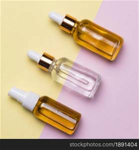 top view serum bottles arrangement. Resolution and high quality beautiful photo. top view serum bottles arrangement. High quality and resolution beautiful photo concept