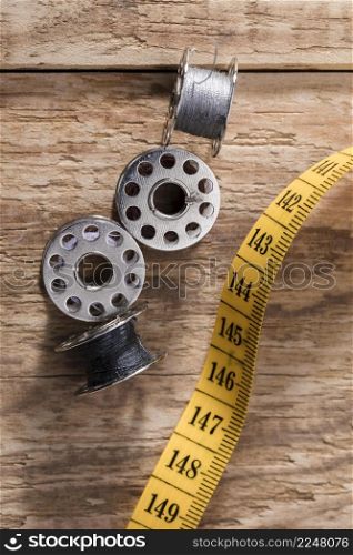 top view sewing machine shuttles with measuring tape