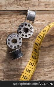 top view sewing machine shuttles with measuring tape