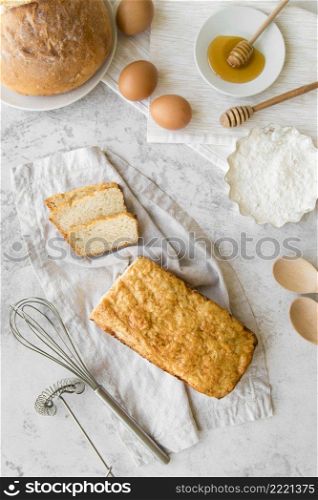 top view sliced banana bread with eggs honey