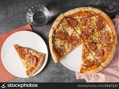 top view sliced pepperoni pizza