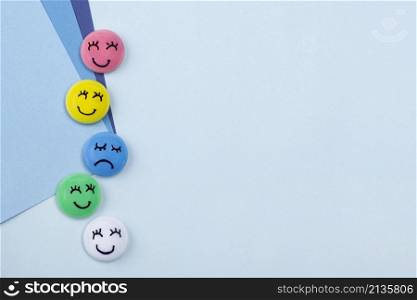 top view smiley sad faces blue monday with copy space