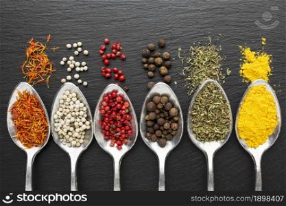 top view spoons with powder condiments. Resolution and high quality beautiful photo. top view spoons with powder condiments. High quality beautiful photo concept