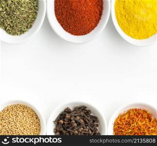 top view spoons with spices powder