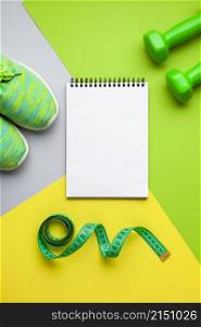 top view sports equipment notebook mock up