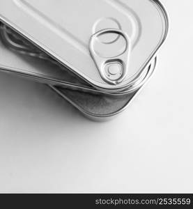 top view stack silver tin cans with copy space