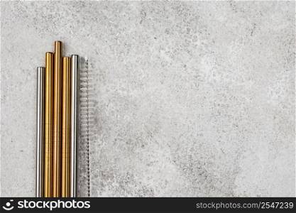 top view stainless metallic straws copy space