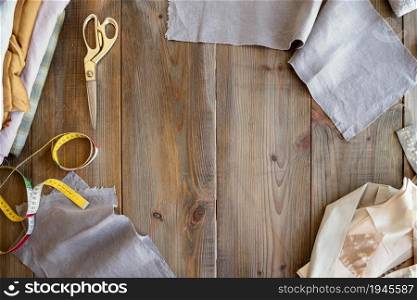 top view tailor workplace background with fabric. High resolution photo. top view tailor workplace background with fabric. High quality photo
