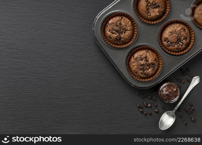 top view tasty muffin dark copy space background