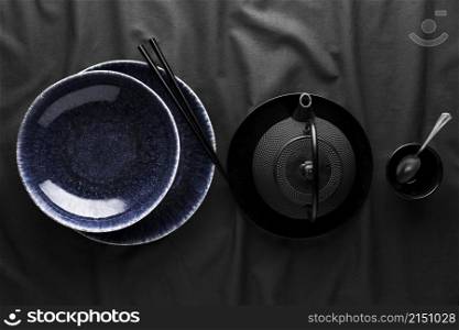 top view teapot with dishware spoon