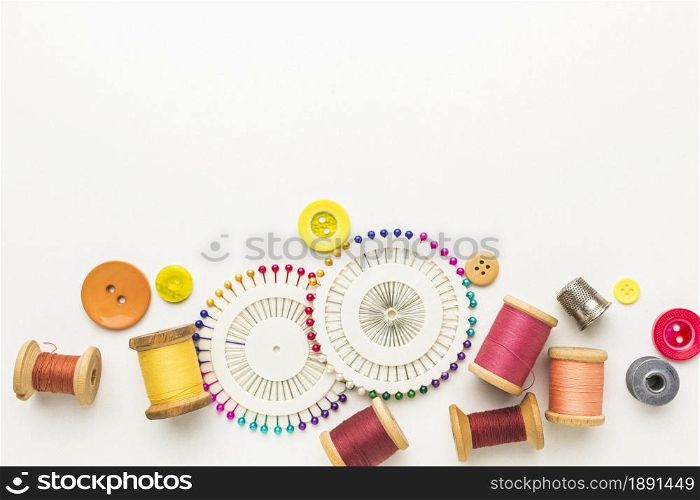 top view thread with needles buttons. Resolution and high quality beautiful photo. top view thread with needles buttons. High quality and resolution beautiful photo concept