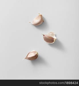 top view three garlic cloves. Resolution and high quality beautiful photo. top view three garlic cloves. High quality beautiful photo concept