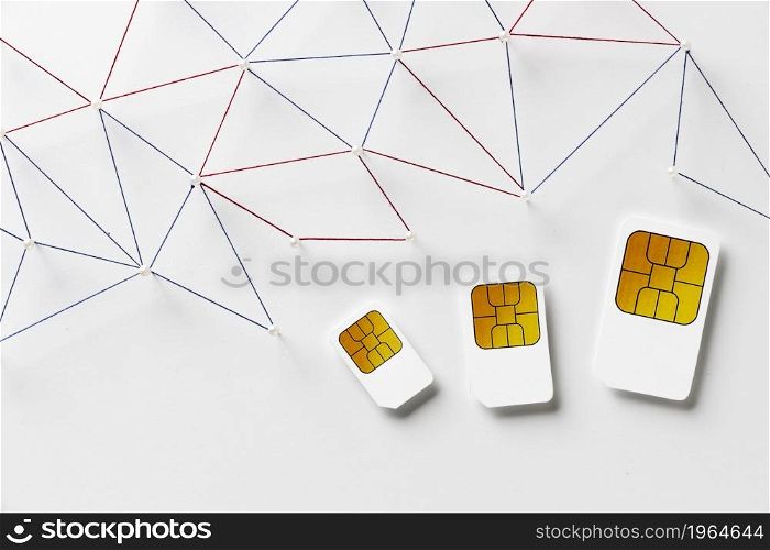 top view three sim cards with internet communication network. High resolution photo. top view three sim cards with internet communication network. High quality photo