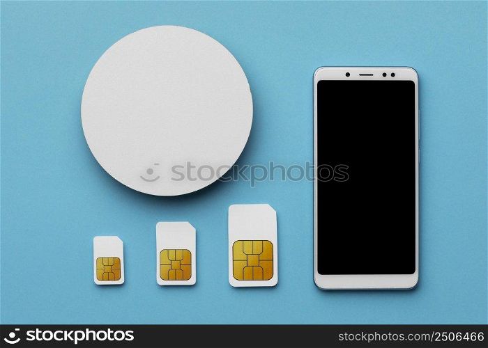 top view three sim cards with smartphone