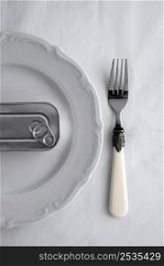 top view tin can plate with fork