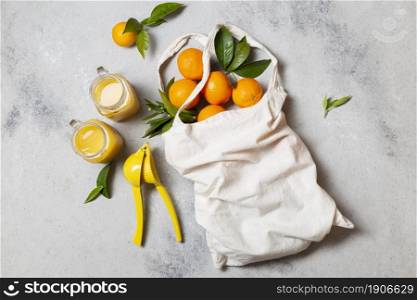 top view tote bag with oranges juice. High resolution photo. top view tote bag with oranges juice. High quality photo
