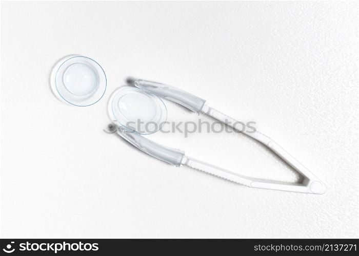 top view transparent contact lenses with tweezers