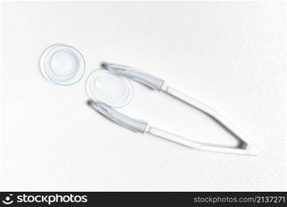 top view transparent contact lenses with tweezers