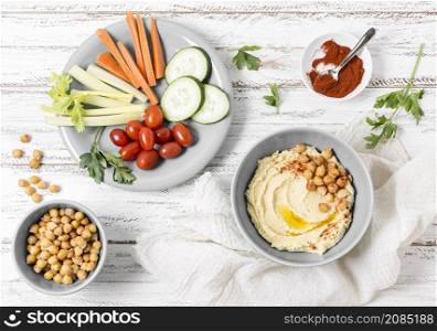 top view vegetables with hummus
